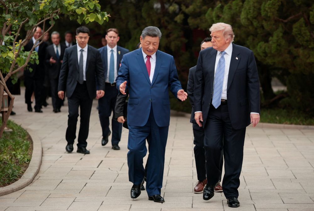 U.S. President Donald Trump walks with Chinese President Xi Jinping while leaving after a visit to the Zhongnanhai Garden in Beijing, May 15, 2026. (OSV News/Reuters/Evan Vucci)