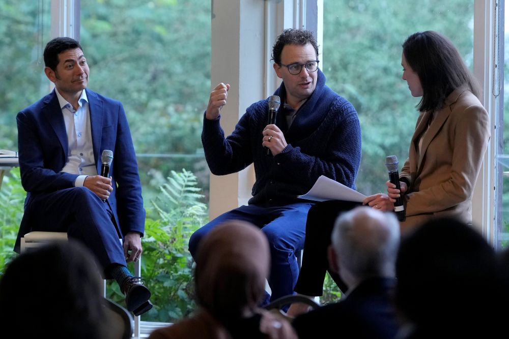 Dario Amodei, CEO and co-founder of Anthropic, middle, speaks on a panel between Tino Cuéllar, president of the Carnegie Endowment for International Peace, left, and Elizabeth Kelly, director of the U.S. AI Safety Institute, at the convening of the International Network of AI Safety Institutes at the Golden Gate Club at the Presidio in San Francisco, Nov. 20, 2024. (AP/Jeff Chiu)