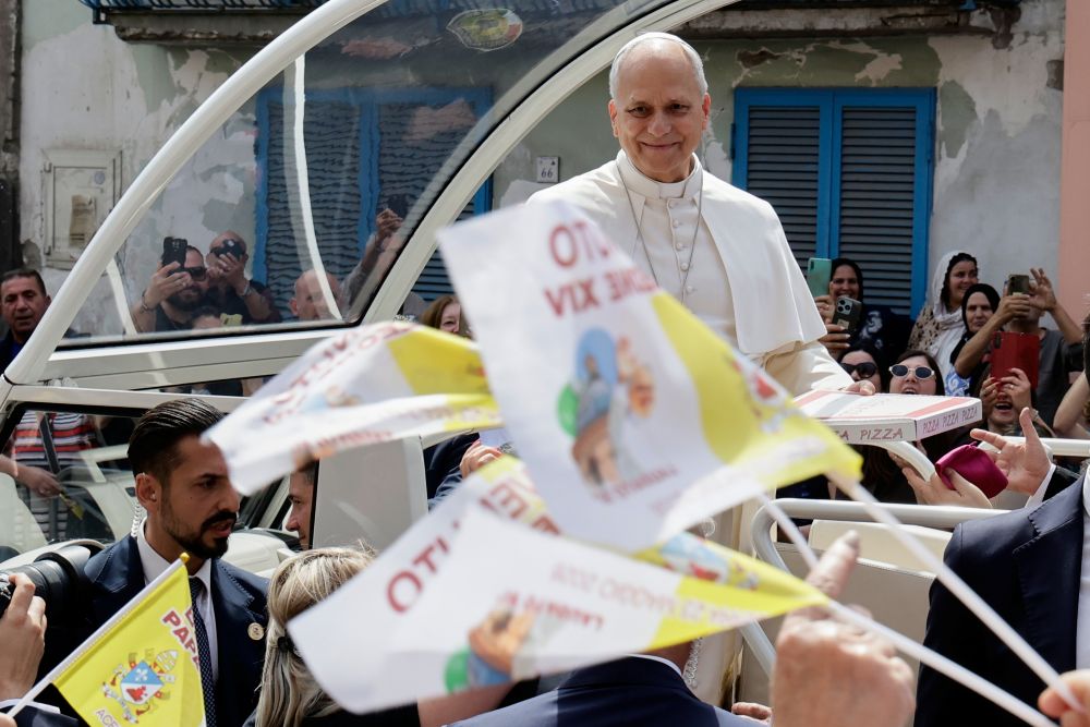 Pope Leo XIV rides on his popemobile during his one-day pastoral visit in Acerra, Italy, May 23, 2026. (AP/Salvatore Laporta)