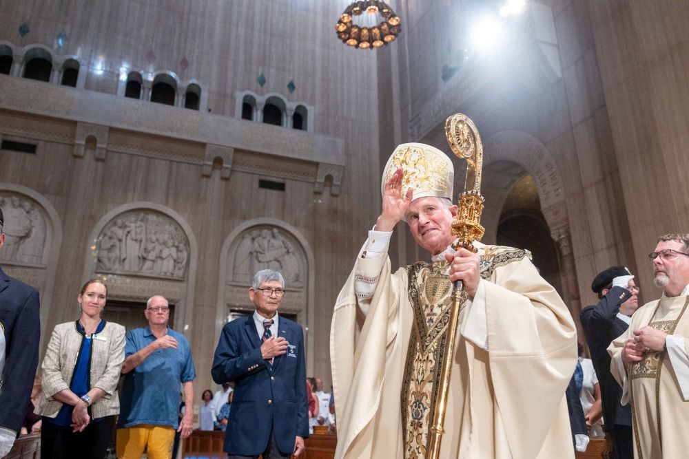 Archbishop Timothy Broglio of the U.S. Archdiocese for the Military Services, gestures as he arrives to concelebrate the annual Pilgrimage and Memorial Mass at the Basilica of the National Shrine of the Immaculate Conception in Washington May 17, 2026. Memorial Day is observed May 25 this year. (OSV News/Catholic Standard/Mihoko Owada)