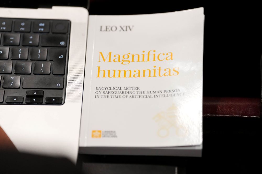 A copy of Pope Leo XIV's first encyclical, "Magnifica Humanitas" (On Safeguarding the Human Person in the Time of Artificial Intelligence,) is seen during a presentation on the document at the Vatican May 25, 2026. (CNS/Lola Gomez)