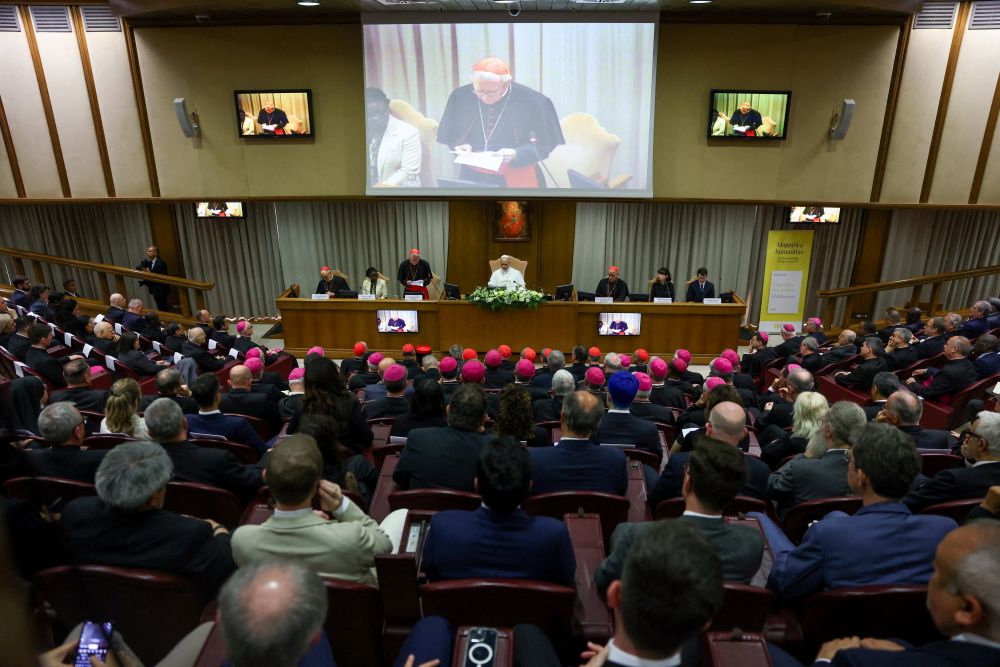 Pope Leo XIV attends the presentation of "Magnifica Humanitas" at the Vatican's Synod Hall May 25, 2026. Also pictured on the panel are Cardinal Michael Czerny, prefect of the Dicastery for Promoting Integral Human Development; Léocadie Lushombo; Cardinal Víctor Manuel Fernández, prefect of the Dicastery for the Doctrine of the Faith; Cardinal Pietro Parolin, Vatican secretary of state; Anna Rowlands; and Anthropic co-founder Christopher Olah. (OSV News/Reuters/Yara Nardi)