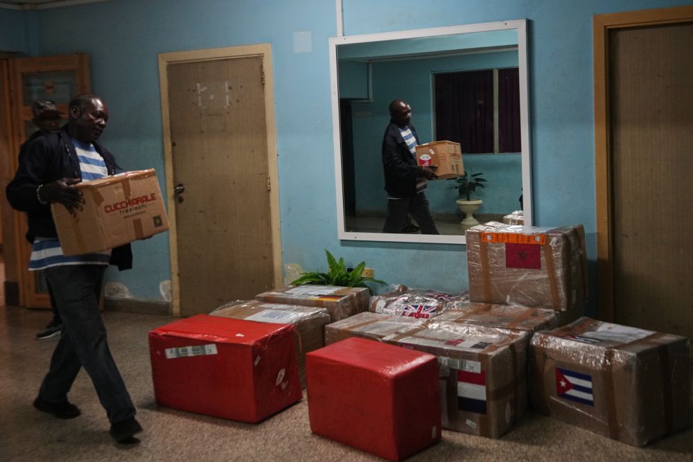 A hospital worker carries medical supplies donated by members of the European Convoy to Cuba in Havana March 16, 2026. (AP/Ramon Espinosa)