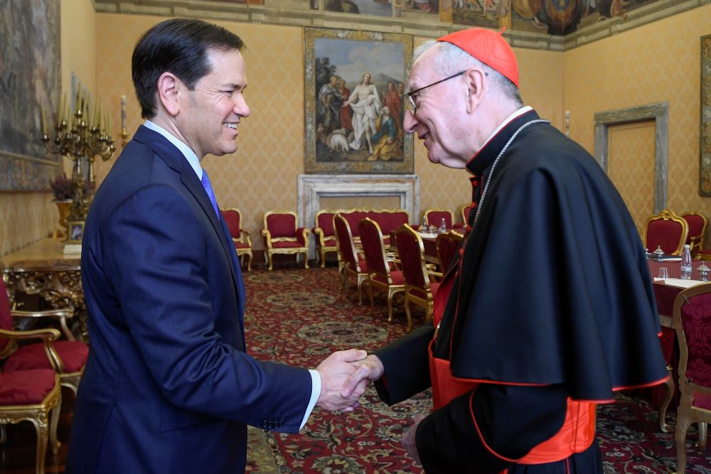 Cardinal Pietro Parolin, Vatican secretary of state, greets U.S. Secretary of State Marco Rubio as he arrives for a private audience with Pope Leo XIV at the Vatican May 7, 2026. (OSV News photo/Vatican Media/Matteo Pernaselci)