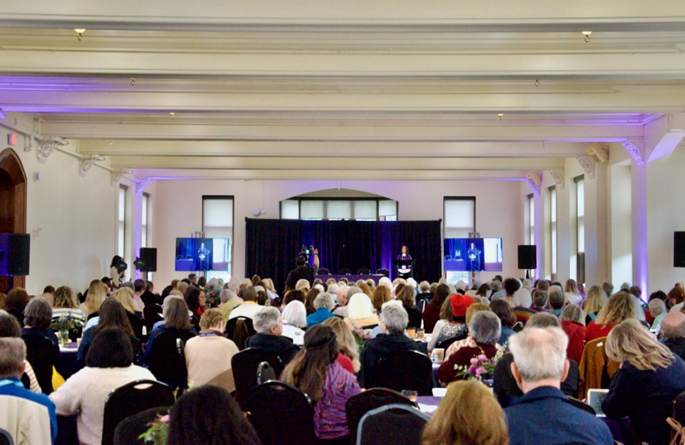 Keynote speaker Teresa Delgado speaks Saturday, May 23, 2026, at the Women's Ordination Conference's 50th anniversary celebration in Detroit. (NCR photo/Dan Stockman)