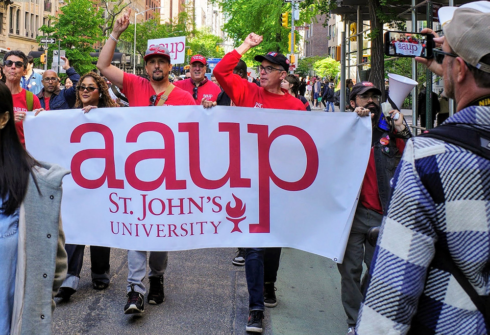 Members of the St. John's University chapter of the American Association of University Professors march May 1, 2026, in New York City. (Courtesy of the St. John's University chapter of the American Association of University Professors)