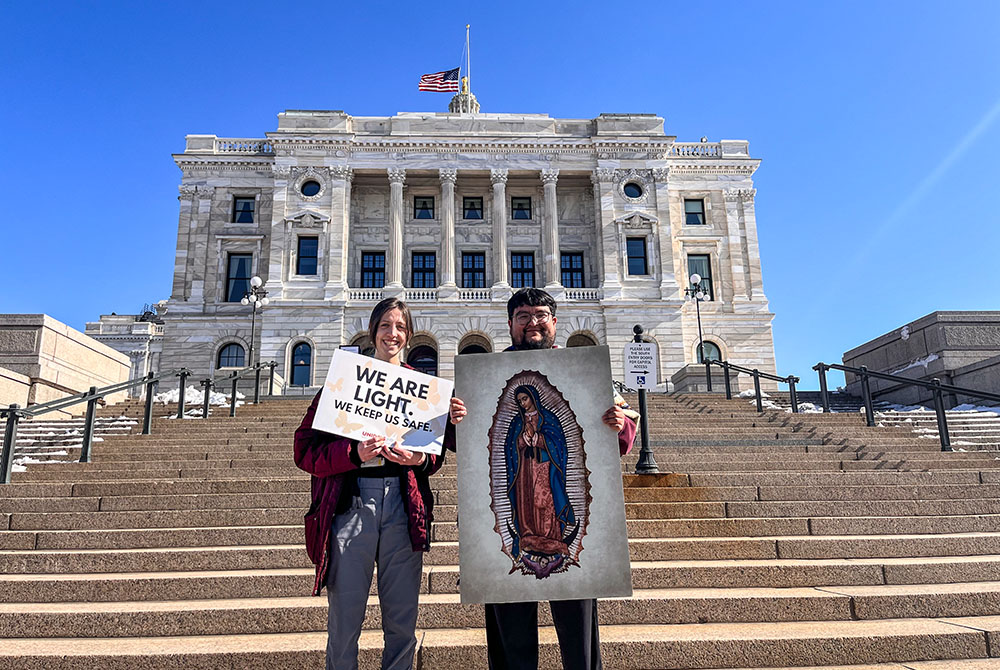 Francisco Escamilla, right, and a Catholic leader with Unidos MN outside the Minnesota State Capitol building in St. Paul before a demonstration in February 2026 (Courtesy of Sofi Marrufo)