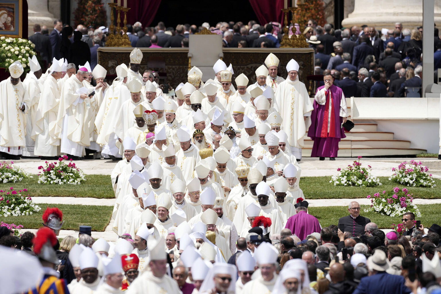 Cardinals and bishops leave after Pope Leo XIV celebrated a Mass for the formal inauguration of his pontificate, in St. Peter’s Square, at the Vatican, May 18, 2025. 