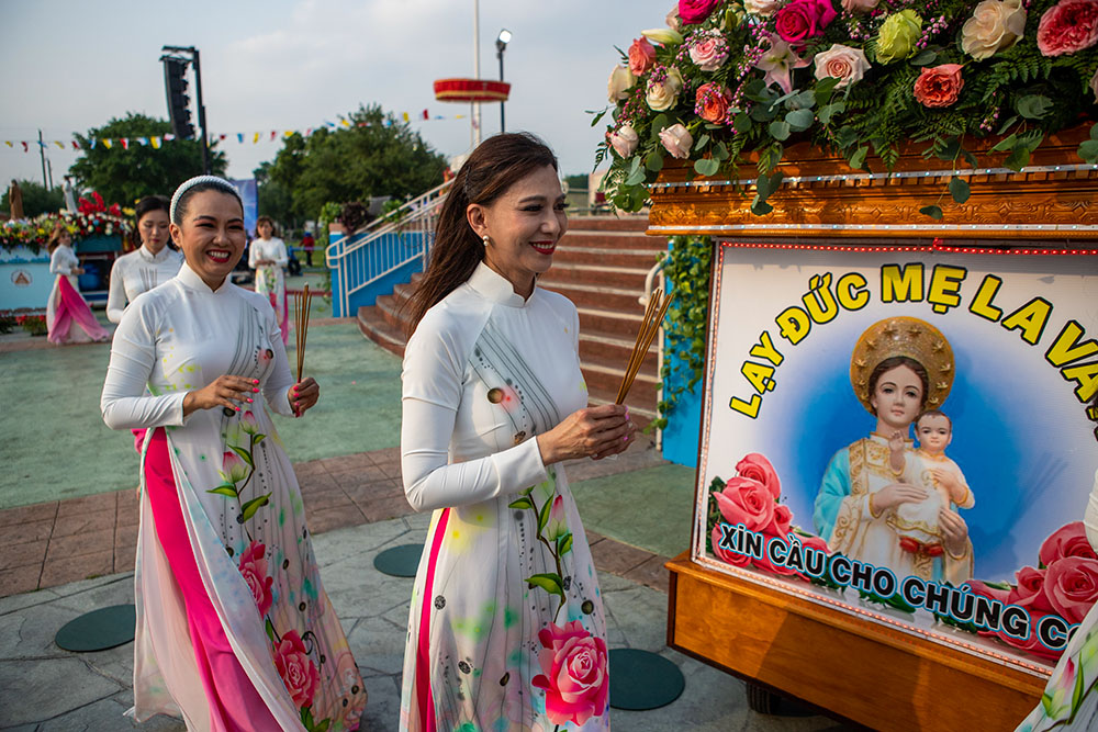 A group of Vietnamese Catholic women perform a dance to honor Mary during a Marian festival at Our Lady of Lavang Catholic Church in Houston May 6, 2023. (OSV News/Texas Catholic Herald/James Ramos)