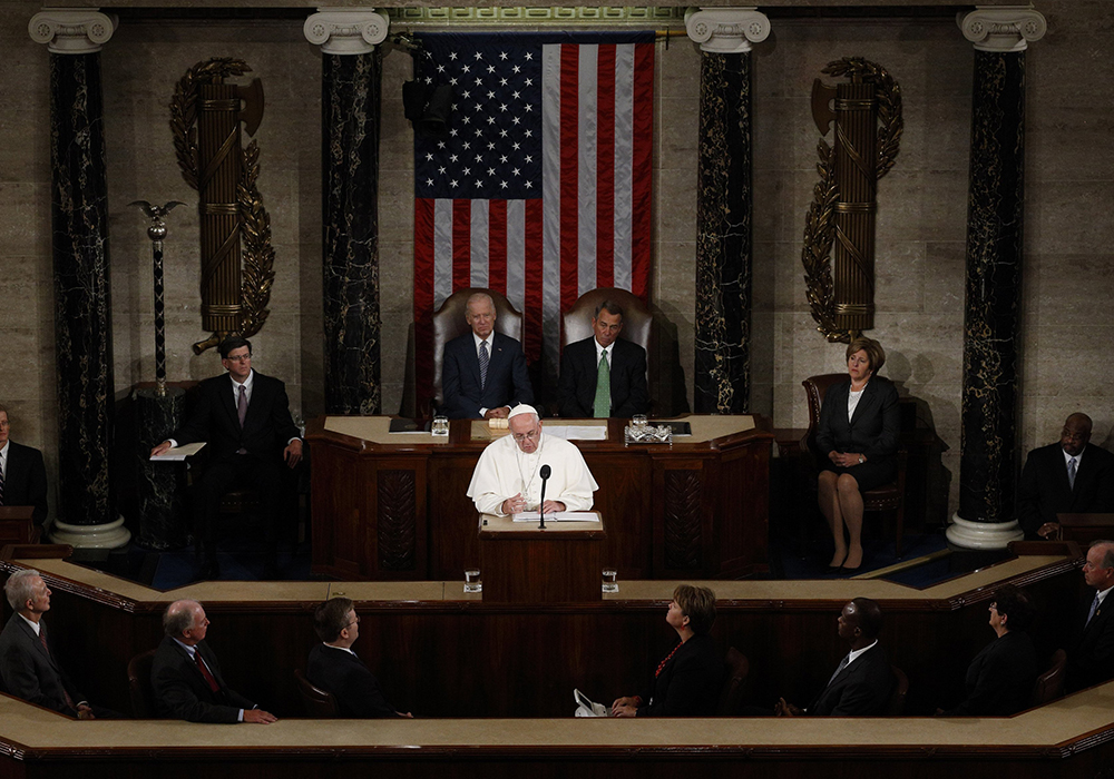 Pope Francis addresses a joint meeting of the U.S. Congress as Vice President Joe Biden, left, and Speaker of the House John Boehner look on in the House of Representatives Chamber at the U.S. Capitol in Washington Sept. 24, 2015. (CNS/Paul Haring)