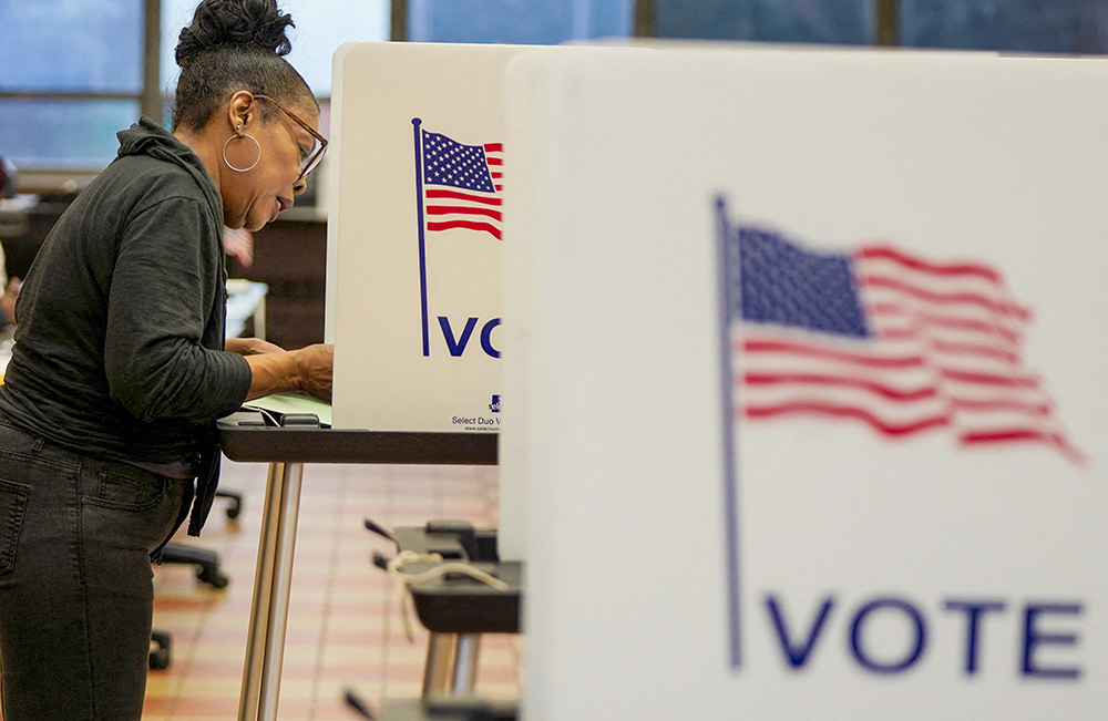 A woman casts her ballot at a polling station in Detroit as Democrats and Republicans held their Michigan presidential primary Feb. 27, 2024. (OSV News/Reuters/Dieu-Nalio Chery)