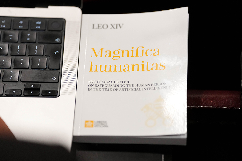A copy of Pope Leo XIV’s first encyclical, “Magnifica Humanitas: On Safeguarding the Human Person in the Time of Artificial Intelligence,” is seen during a presentation on the document at the Vatican May 25, 2026. (CNS/Lola Gomez)