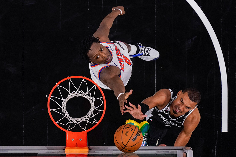 New York Knicks forward Og Anunoby and San Antonio Spurs forward Victor Wembanyama battle for the ball during Game 1 of the 2026 NBA Finals in San Antonio June 3, 2026. (OSV News/Eric Gay-Pool Photo via Imagn Images via Reuters)