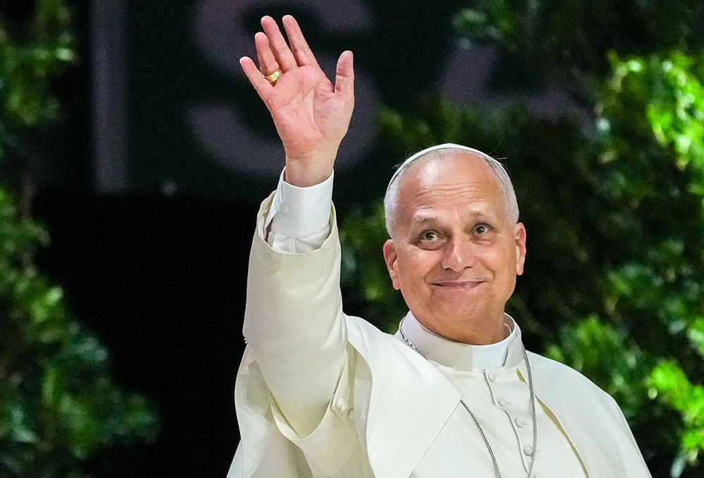 Pope Leo XIV greets people gathered for the “Building Networks with the World of Culture, Art, Economy and Sport” meeting at the Movistar Arena in Madrid June 7, 2026. (CNS/Lola Gomez)
