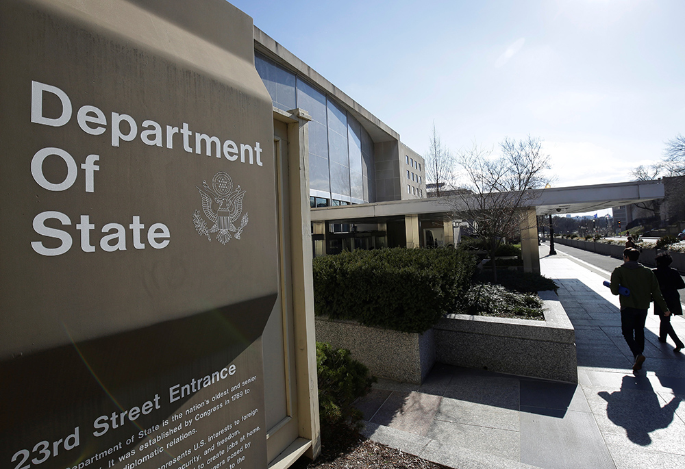People are pictured in a file photo entering the U.S. Department of State building in Washington. (OSV News/Reuters/Joshua Roberts)