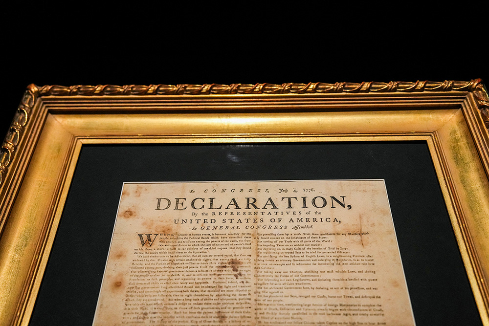 A July 1776 printing of the Declaration of Independence: The Exeter Broadside hangs on the wall during a press preview at Sotheby's in New York City, January 17, 2025. (OSV News/Reuters/Adam Gray)