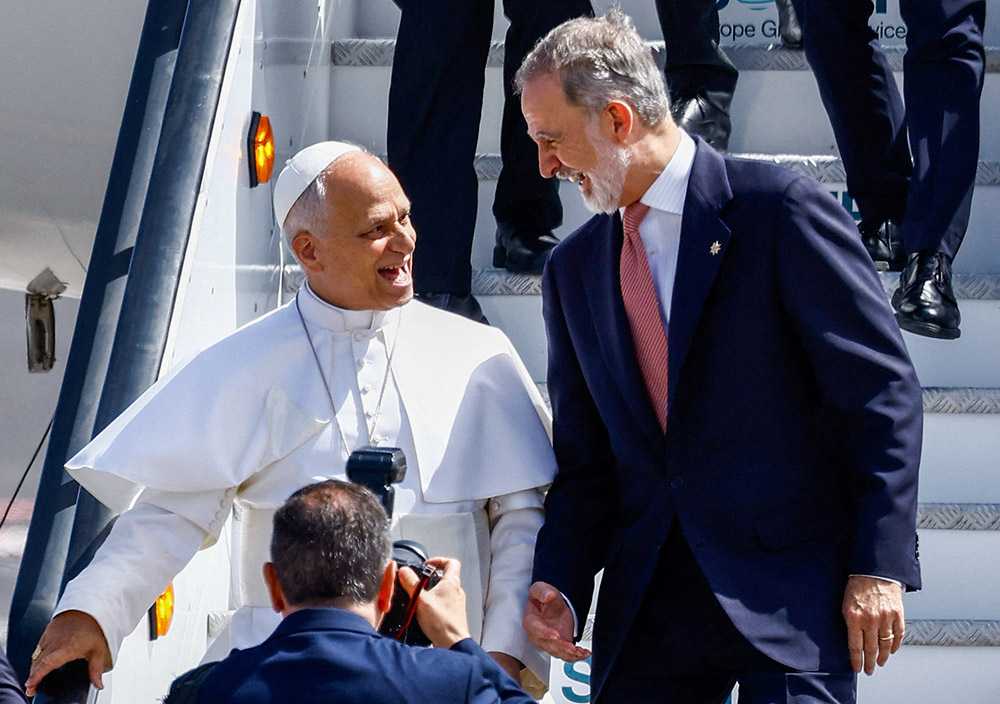 Pope Leo XIV and Spain's King Felipe VI leave the plane on which the pope was due to depart following a delay for maintenance issues, at Tenerife Norte-Ciudad de La Laguna Airport, Canary Islands, Spain, June 12, 2026. (OSV News/Reuters/Borja Suarez)