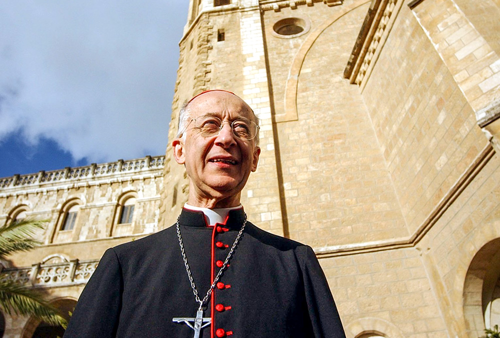 Italian Cardinal Camillo Ruini stands in the courtyard of Notre Dame Center in Jerusalem April 23, 2004. (CNS/Debbie Hill)