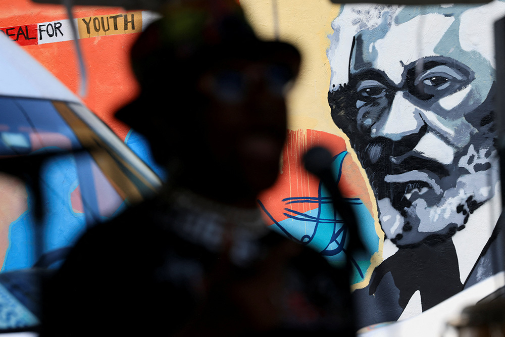 A mural of Frederick Douglass appears in the backdrop of an event to celebrate the Juneteenth federal holiday in Washington June 19, 2025. (OSV News/Reuters/Kevin Mohatt)