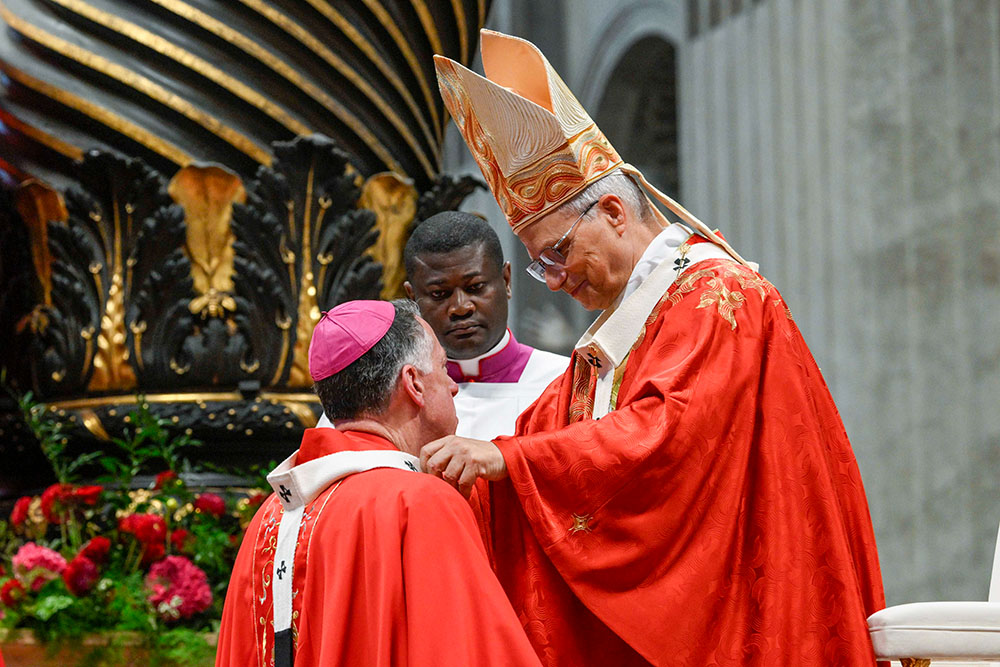 Pope Leo XIV presents the pallium to New Orleans Archbishop James Checchio in St. Peter's Basilica at the Vatican June 29, 2026. (OSV News/Vatican Media/Simone Risoluti)