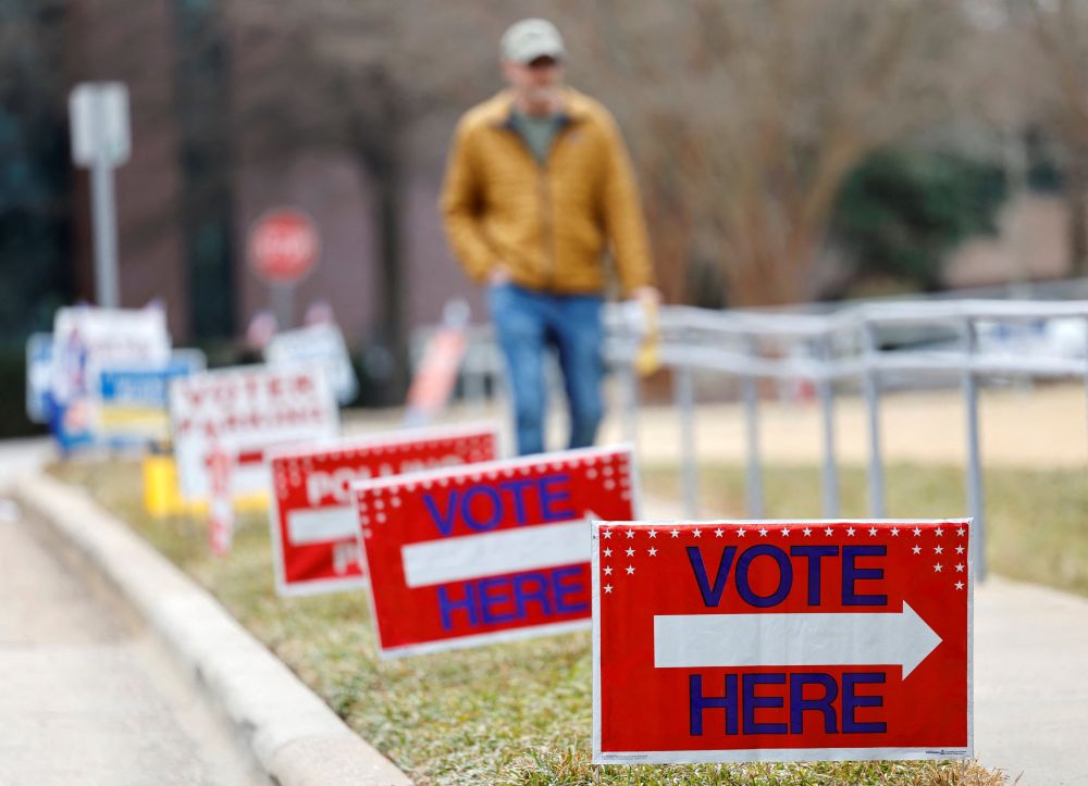 A voter walks toward his polling place in Cary, N.C., during his state's primary election March 3, 2026, to choose candidates for the November midterm elections. (OSV News/Reuters/ Jonathan Drake)