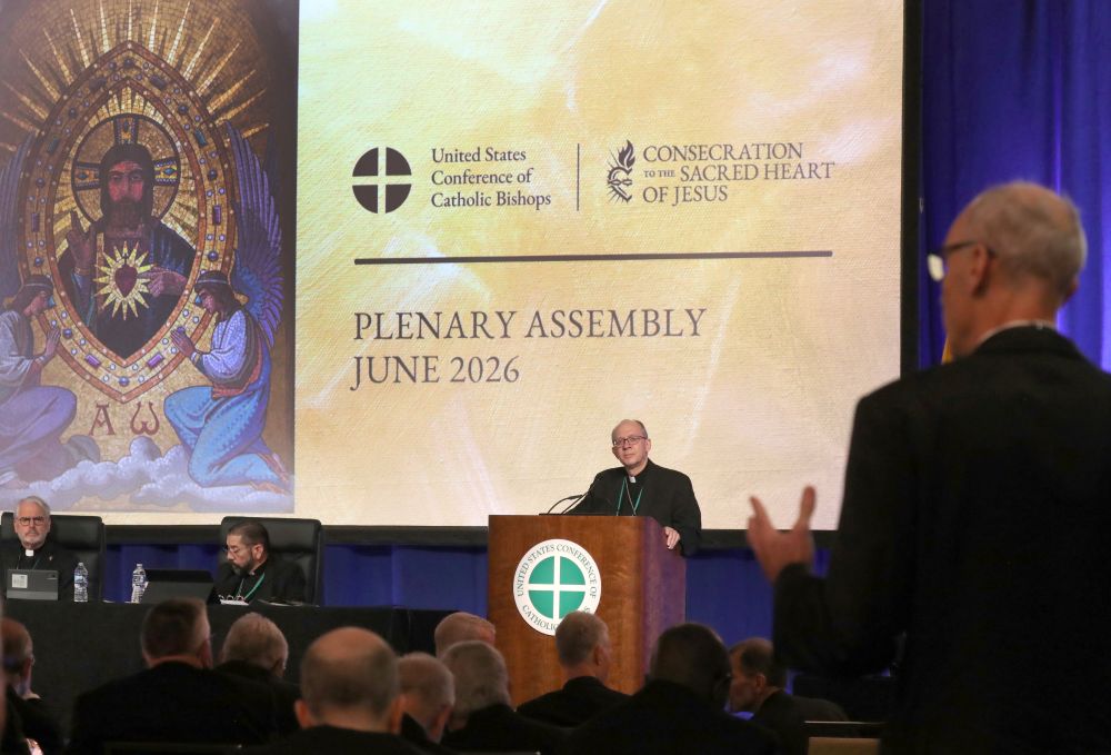 Bishop Barry Knestout of Richmond, Va., chairman of the bishops' Committee on the Protection of Children and Young People, listens as Baltimore Auxiliary Bishop Adam Parker asks a question during a June 11, 2026, session of the annual spring meeting of the U.S. Conference of Catholic Bishops in Orlando, Fla. (OSV News/Bob Roller)