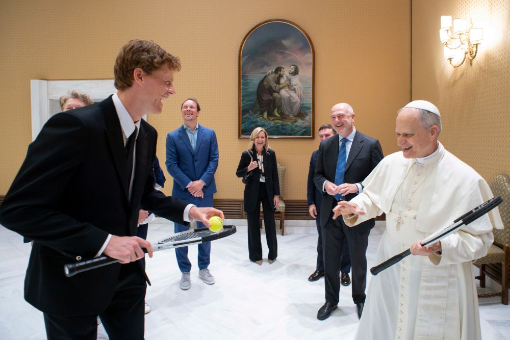 Italy's top-ranked tennis player Jannik Sinner, left, shares a light moment with Pope Leo XIV during their meeting at the Vatican, May 14, 2025. (AP/Vatican Media)