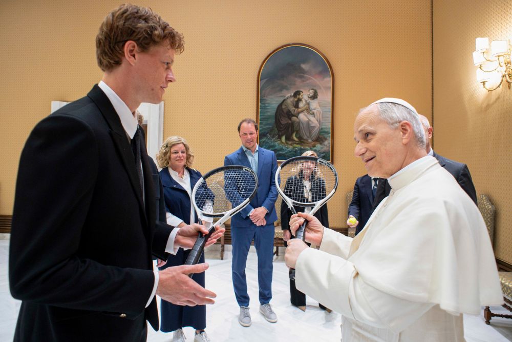 Italy's top-ranked tennis player Jannik Sinner, left, shares a light moment with Pope Leo XIV during a meeting at the Vatican May 14, 2025. (AP/Vatican Media)