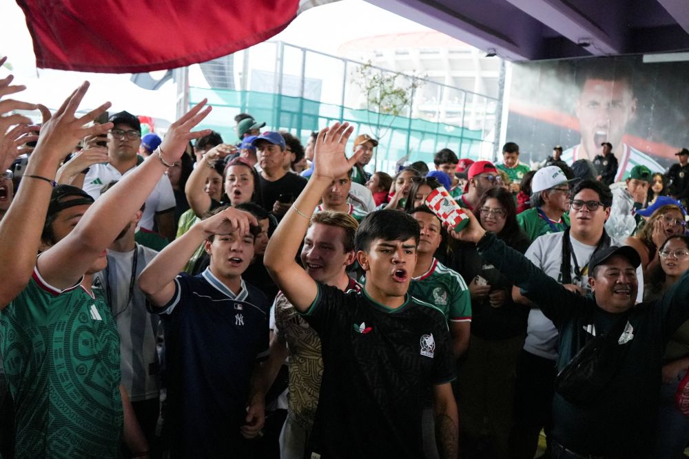 People gather outside Mexico City Stadium to celebrate Mexico's victory in the opening match of the 2026 FIFA World Cup June 11, 2026. (OSV News/Reuters/Fred Ramos) 