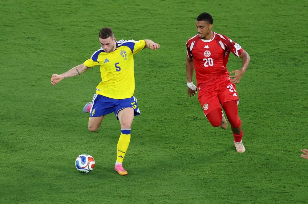 Sweden's Gabriel Gudmundsson and Tunisia's Yan Valery interact during the FIFA World Cup 2026 Group F Sweden vs. Tunisia at Estadio Monterrey, Monterrey, Mexico, June 14, 2026. (OSV News/Reuters/Raquel Cunha) 