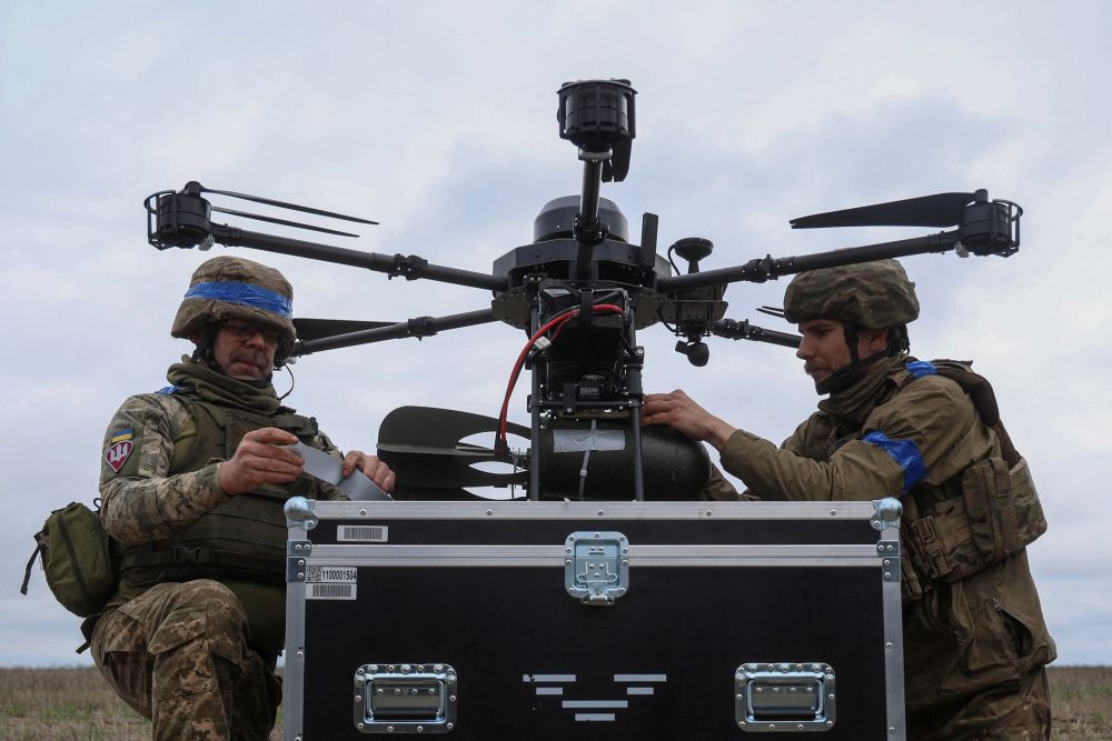 Ukrainian servicemen of the 25th Airborne Brigade attach small air bombs to a Vampire, a heavy unmanned aerial vehicle, near a front line, amid Russia's attack on Ukraine, in Donetsk region, Ukraine April 5, 2025. (OSV News/Reuters/Oleksandr Ratushniak)