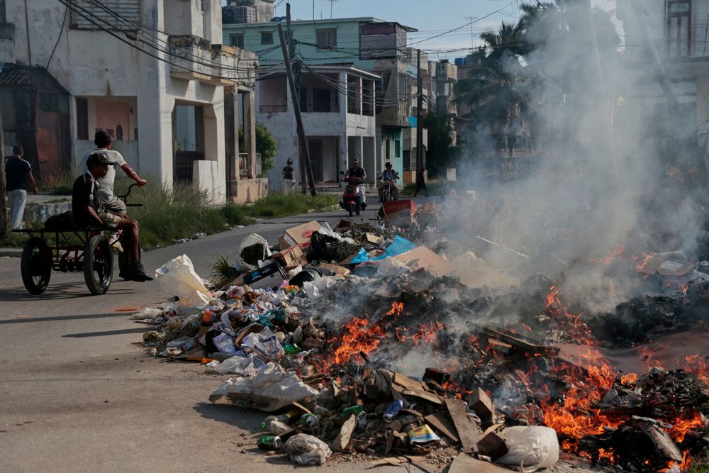 A pile of trash burns in Havana, Cuba, June 17, 2026. (RNS/AP/Jorge Luis Banos)