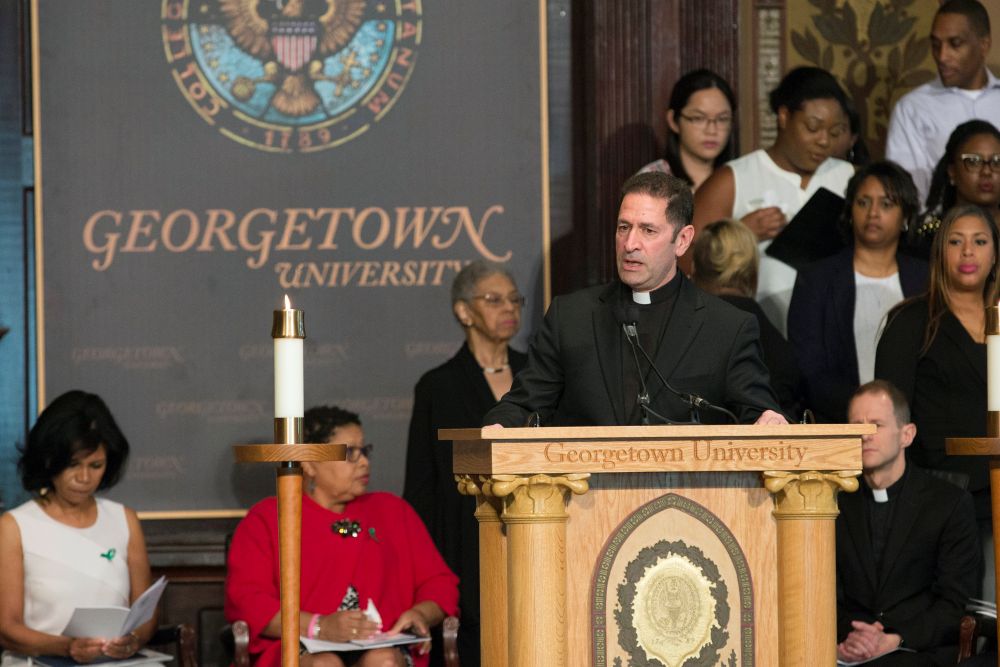 Jesuit Fr. Timothy Kesicki, then president of the Jesuit Conference of Canada and the United States, delivers the homily at an April 18, 2017, "Liturgy of Remembrance, Contrition and Hope" in Gaston Hall on the campus of Georgetown University in Washington. (CNS/Catholic Standard/Jaclyn Lippelmann) 