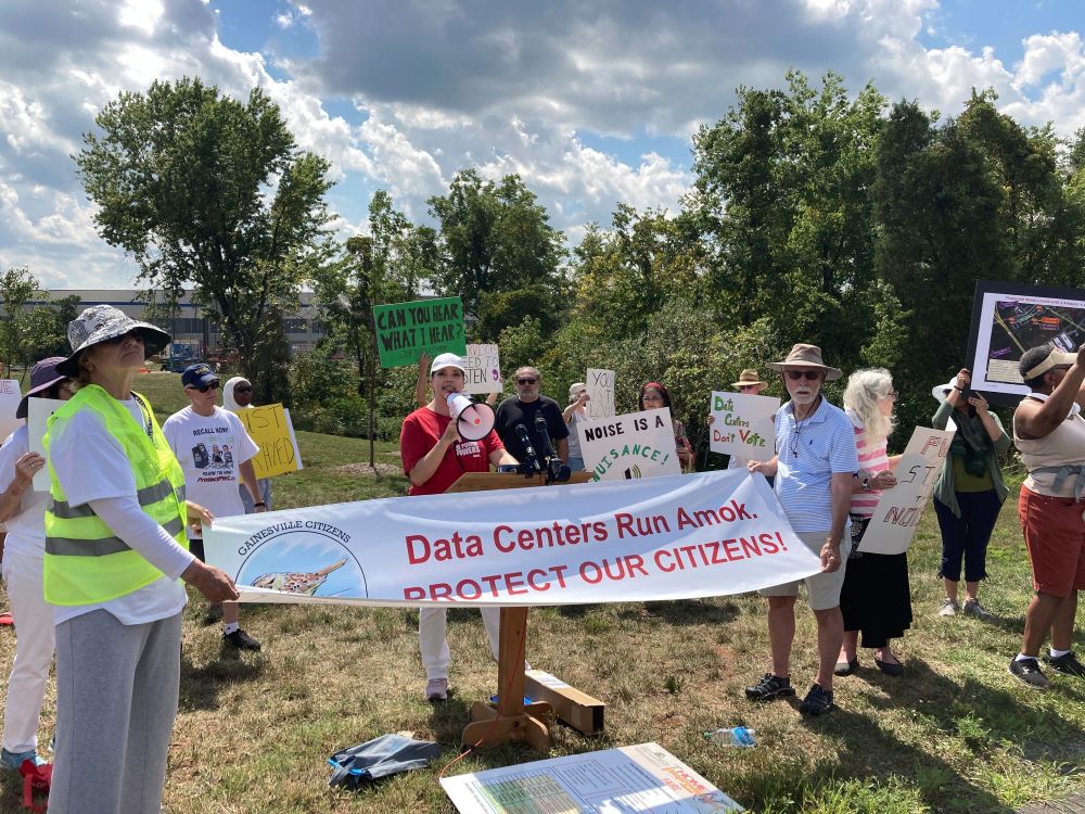 Spencer Snakard, president of Protect Fauquier, speaks Aug. 29, 2022, at a rally near Manassas, Va., protesting a newly built data center for Amazon Web Services. Virginia currently houses 609 data centers, the most in the United States. (AP/Matthew Barakat, file)
