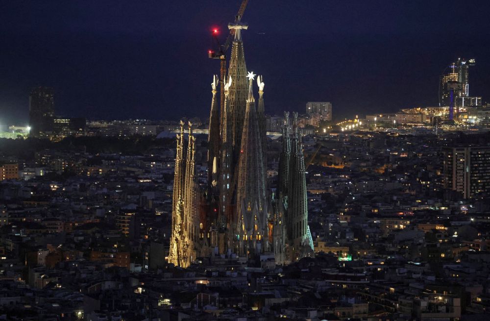 Lights illuminate the Basilica of the Holy Family, or Sagrada Família in Barcelona, Spain, June 3, 2026. Pope Leo XIV will visit the famed basilica during his June 6-12 apostolic visit to Spain. (OSV News/Reuters/Nacho Doce)