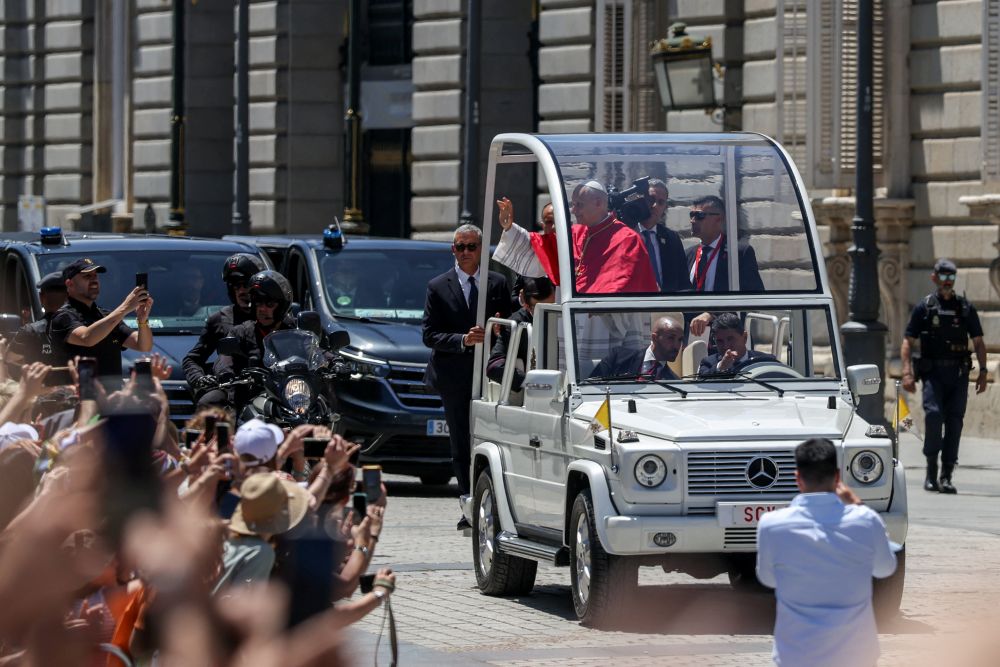Pope Leo XIV waves to the faithful from the popemobile during his apostolic journey, in Madrid, June 6, 2026. His visit to Spain runs June 6-12. (OSV News/Reuters/Alejandro Martinez)