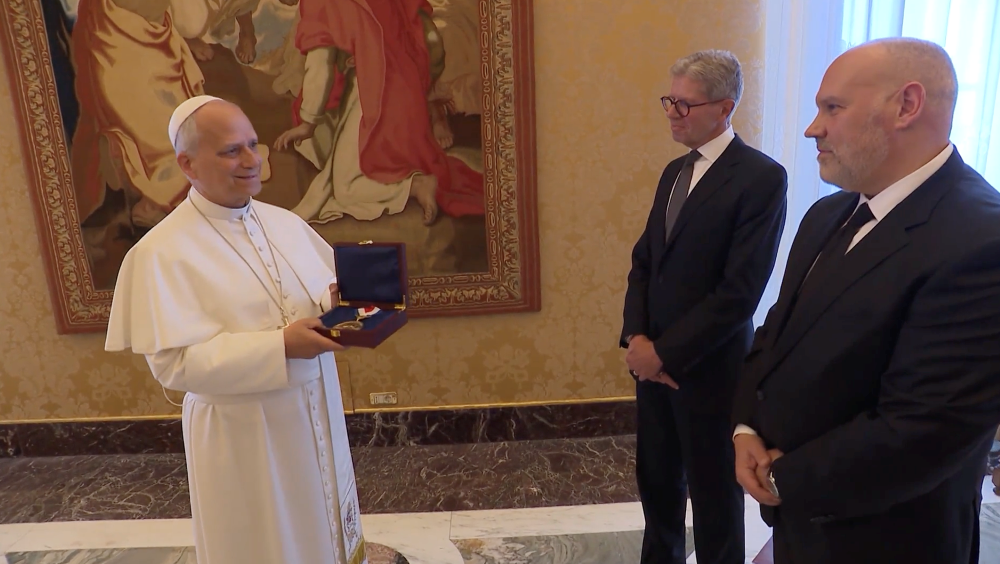 Pope Leo XIV receives the 2026 Liberty Medal from the National Constitution Center from the center's Interim President and CEO Vince Stango and Chair Mike George during a Vatican ceremony on April 30. (Courtesy of the National Constitution Center)