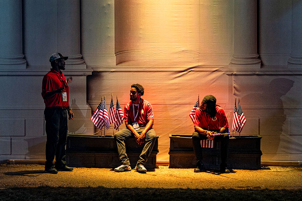 Workers rest after the Great American State Fair on the National Mall closed for the day, June 29, 2026, in Washington. (AP/Jen Golbeck)