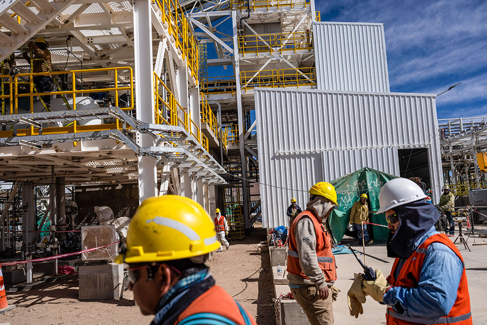 Workers walk through the construction of the Cauchari-Olaroz Exar lithium mine in Jujuy province, Argentina, April 22, 2023. Argentina's current president, Javier Milei, took office later that year. (AP/Rodrigo Abd)