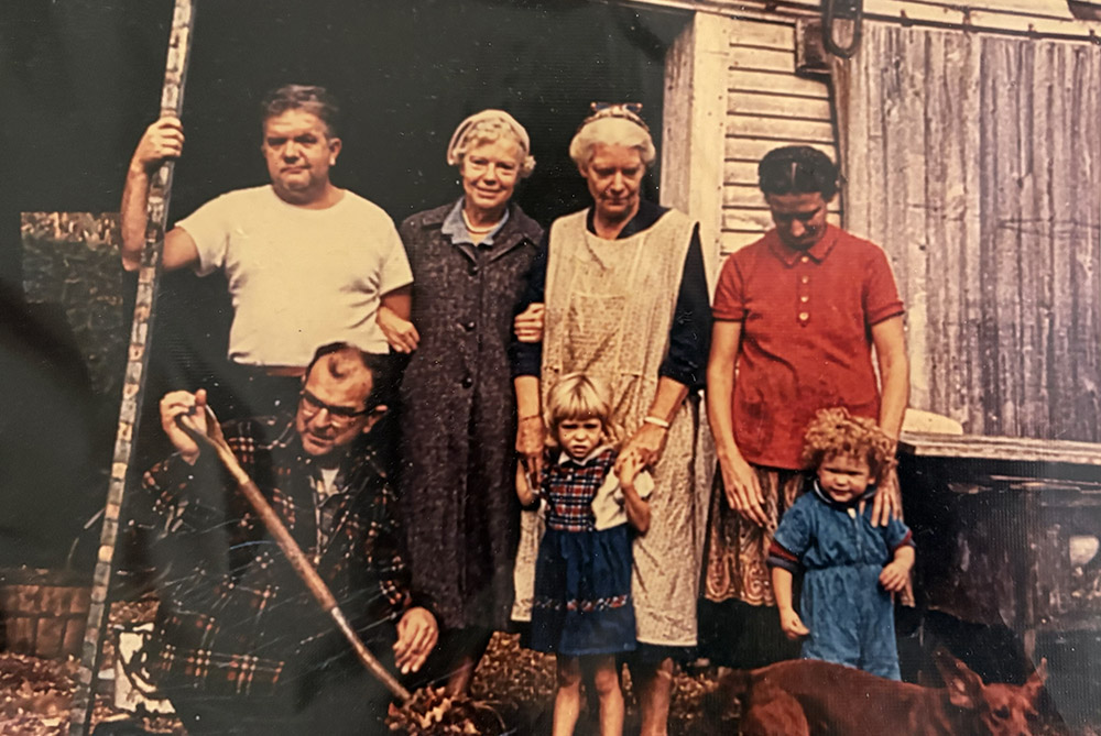 A 1960 photo shows, back row, from left: David William Hennessy (Martha Hennessy's father), Della Day (Dorothy Day's sister), Dorothy Day and her daughter, Tamar. Front row, from left: A Catholic Worker member named Stanley, Martha Hennessy and Hilaire Hennessy. (Courtesy of Martha Hennessy)