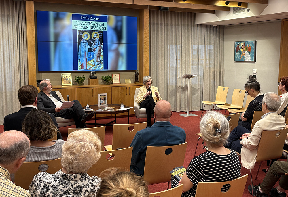 Phyllis Zagano, professor at Hofstra University, author and scholar of religious studies, presents her new book The Vatican and Women Deacons at the America Media headquarters in New York, May 21, 2026. At left is Robert Ellsberg, publisher of Orbis Books. (NCR photo/Camillo Barone)