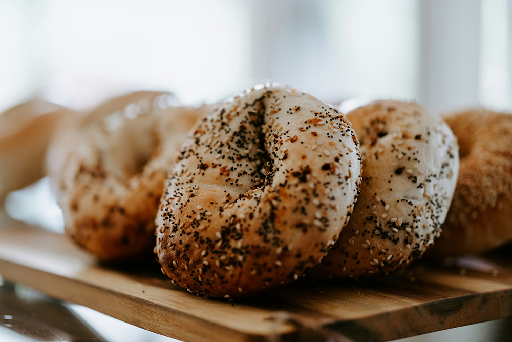 Bagels on a board (Unsplash/Claudio Schwarz)