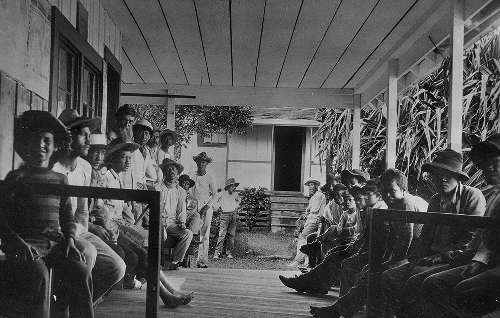 Joseph Dutton and the boys on the porch of the Baldwin Home in 1907, Kalawao, Molokai, Hawaii (Courtesy of Hawaii State Archives)