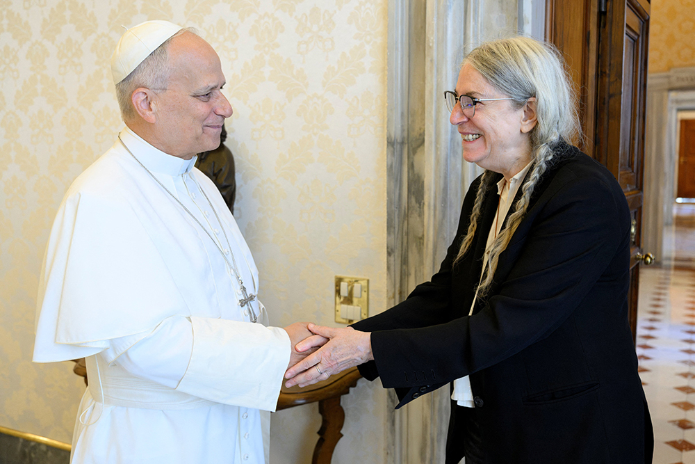 Pope Leo XIV greets American singer-songwriter, poet, and artist, Patti Smith during a private audience at the Vatican’s Apostolic Palace July 31, 2026. (OSV News/Vatican Media/Simone Risoluti)