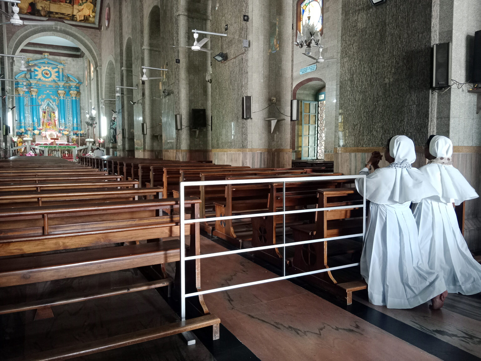 Nuns pray at the Basilica of the Holy Rosary, locally known as the Bandel Church, on May 30, 2026, near Kolkata, India. 