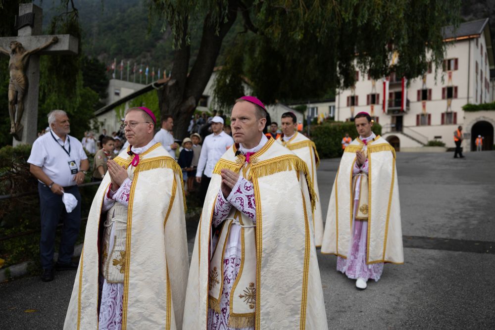The newly consecrated SSPX bishops process to the seminary courtyard after the July1 consecration outside St. Pius X seminary, in Econe, Switzerland, July 1, 2026. (Courtesy of  Society of Saint Pius X)