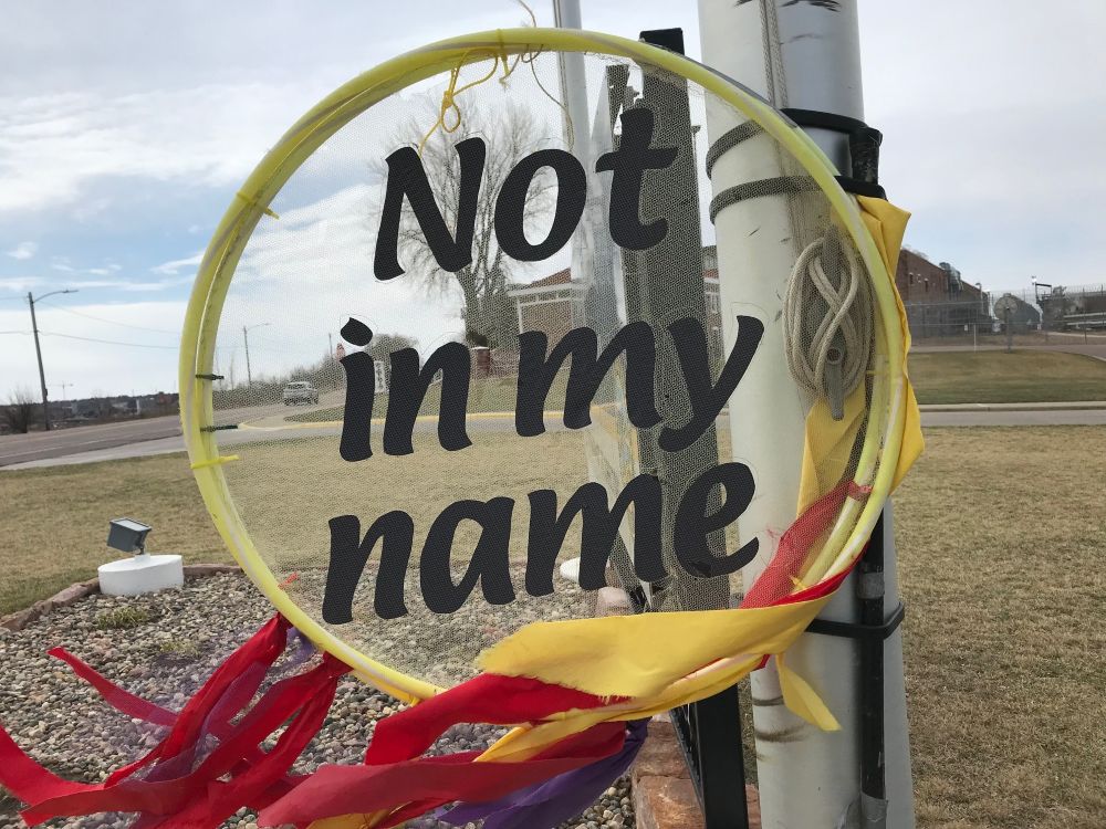 A sign opposing the death penalty is displayed during the Presentation Sisters' annual gathering, held each Good Friday, at the South Dakota Penitentiary. (Courtesy of Presentation Sisters)