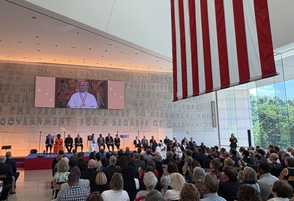 Pope Leo XIV appears via livestream from the Vatican during the Liberty Medal ceremony from the National Constitution Center in Philadelphia July 3, 2026. About people attended, including civic leaders, religious representatives from more than 30 faith traditions, Catholic leaders and many of the pope's longtime Augustinian friends. (NCR photo/Camillo Barone)