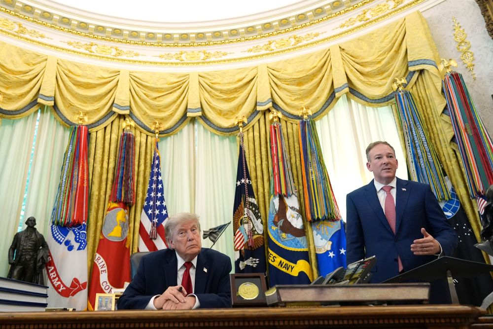Environmental Protection Agency administrator Lee Zeldin speaks as President Donald Trump listens before Trump signs a presidential memo regarding pollution control in vehicles, in the Oval Office of the White House June 29, 2026, in Washington. (AP/Jacquelyn Martin)
