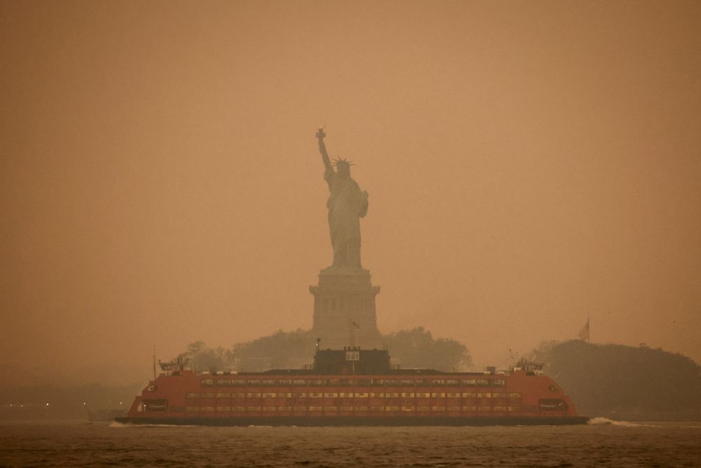 The Statue of Liberty is covered in haze and smoke caused by wildfires in Canada, in New York June 6, 2023. (OSV News/Reuters/Amr Alfiky)